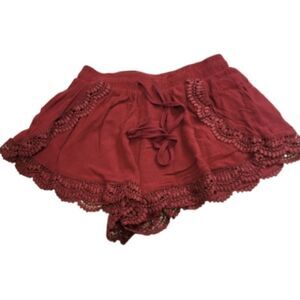 Charlotte Russe lace trimmed loose dress shorts M
